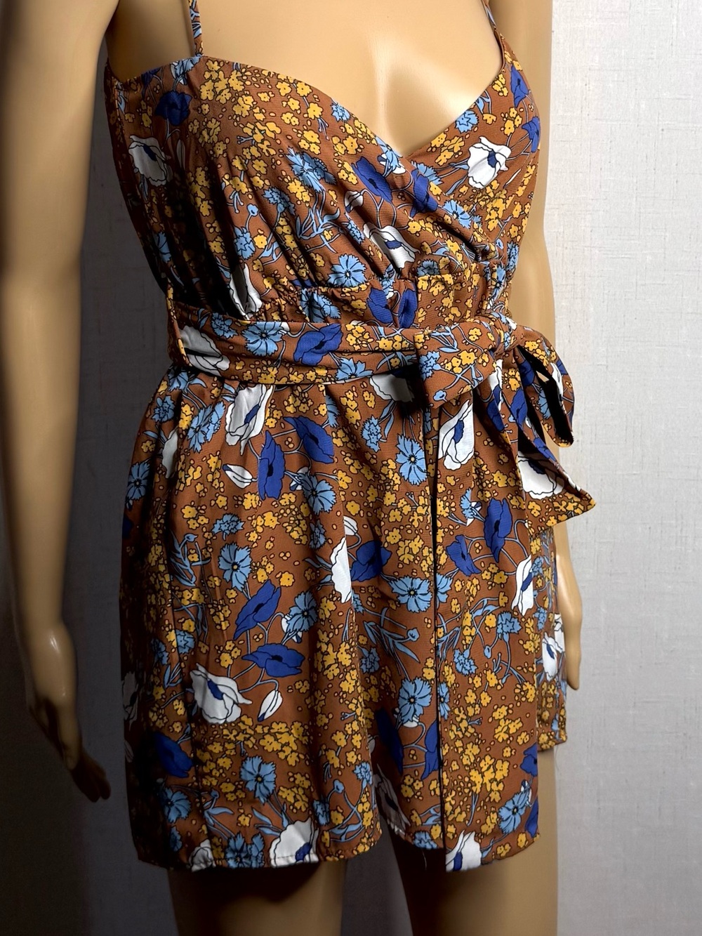 Sienna Sky floral romper with attached belt. Sz. M